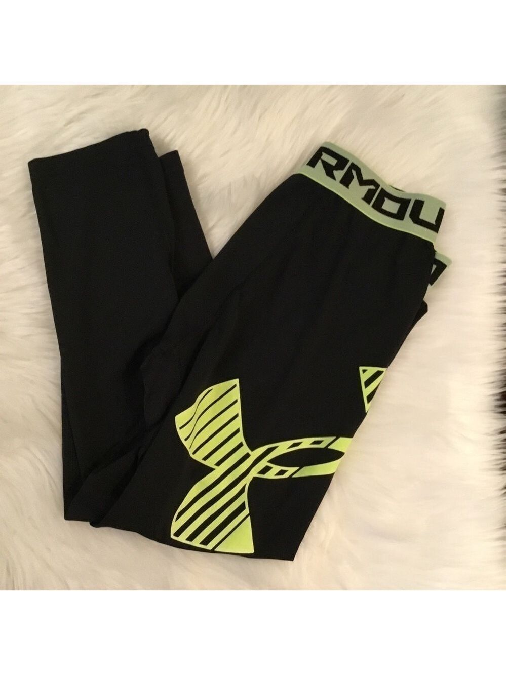 Under Armour youth large black with bright yellow fitted heat gear